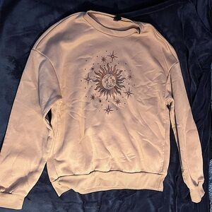 Oversized tan sweatshirt with moon/sun design!